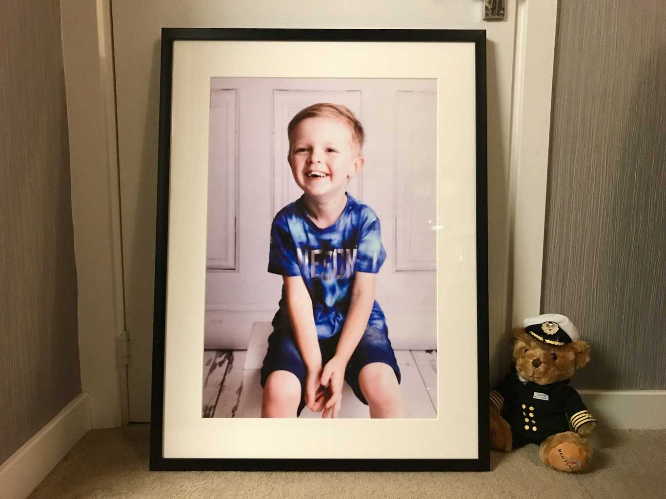Little Boy In A Big Picture