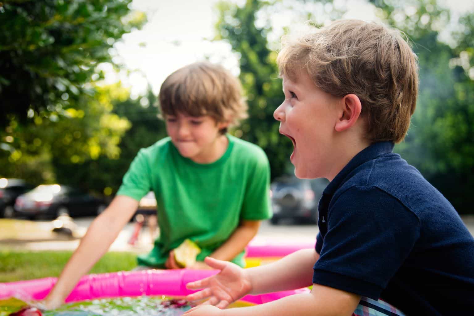 Children playing outside, away from technology
